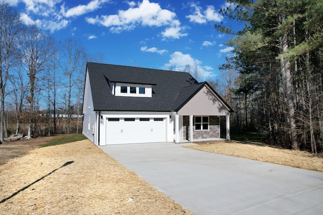 view of front of property with a garage