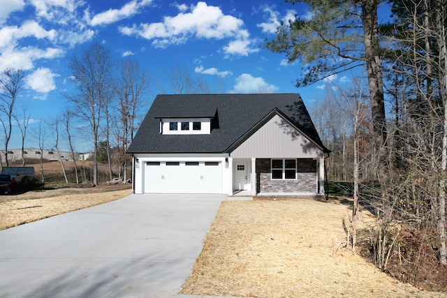 view of front of property with a garage