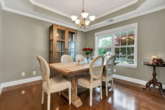 1010 Bradford Pl, Cohutta, GA 30710 - dining area with a chandelier, wood-type flooring, a tray ceiling, baseboards, and crown molding