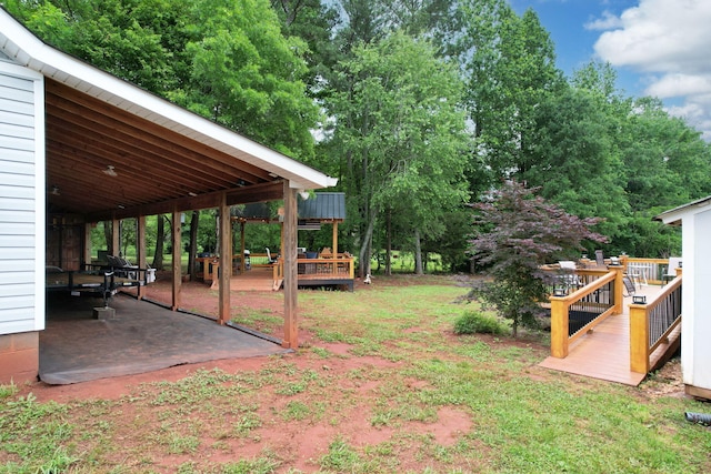1010 Bradford Pl, Cohutta, GA 30710 - view of yard featuring a wooden deck and a patio area
