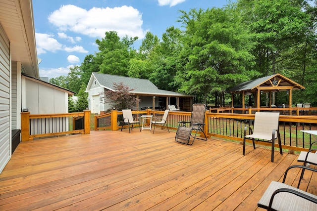 1010 Bradford Pl, Cohutta, GA 30710 - wooden terrace with a gazebo, an outbuilding, and view of scattered trees