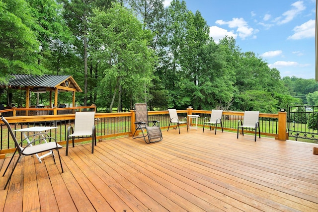 1010 Bradford Pl, Cohutta, GA 30710 - wooden deck featuring a gazebo and view of wooded area