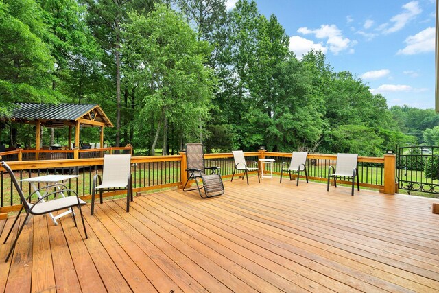 1010 Bradford Pl, Cohutta, GA 30710 - wooden deck featuring a gazebo and view of wooded area