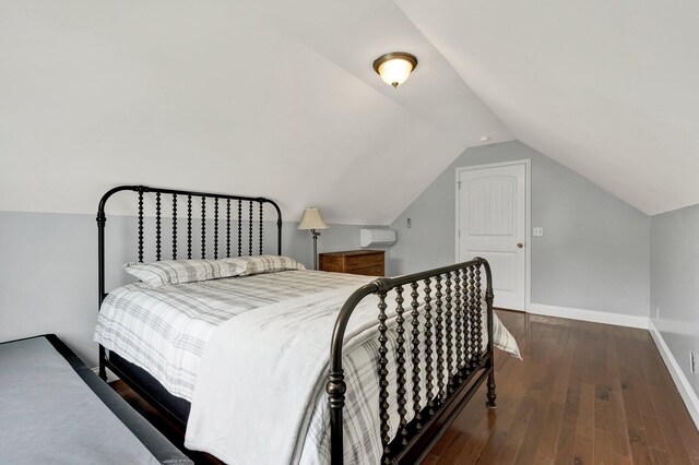 1010 Bradford Pl, Cohutta, GA 30710 - bedroom with vaulted ceiling, wood finished floors, and baseboards
