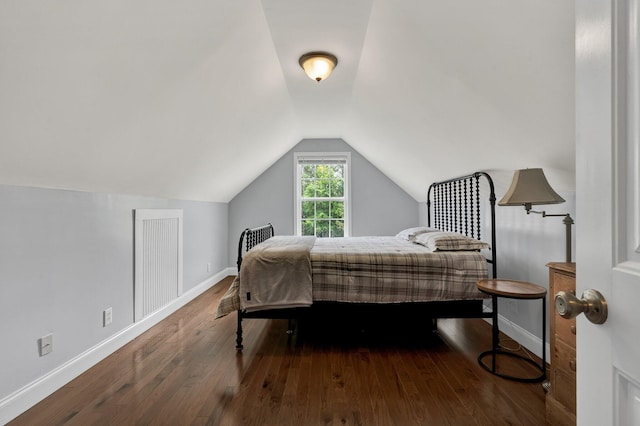 1010 Bradford Pl, Cohutta, GA 30710 - bedroom featuring vaulted ceiling, baseboards, and hardwood / wood-style floors