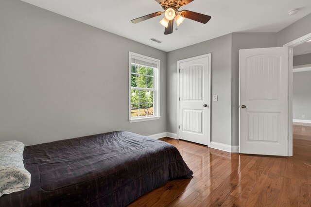 1010 Bradford Pl, Cohutta, GA 30710 - bedroom featuring wood-type flooring, baseboards, and a ceiling fan