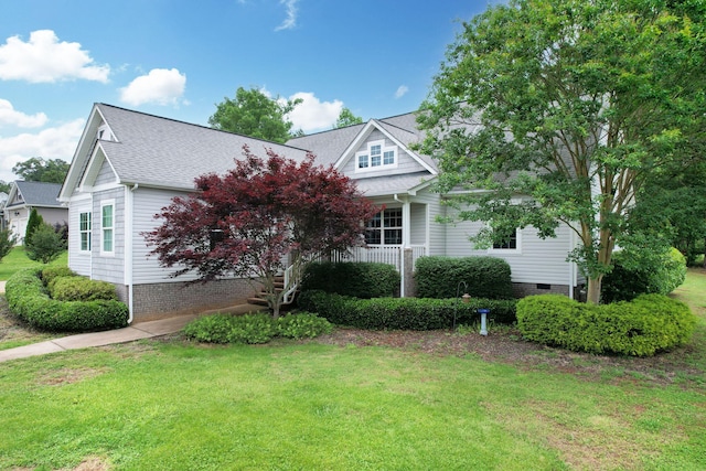 1010 Bradford Pl, Cohutta, GA 30710 - obstructed view of property featuring a front yard, a shingled roof, and a porch