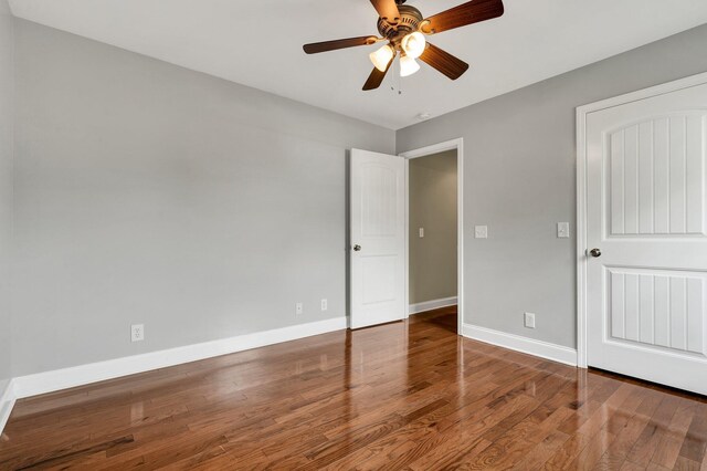 1010 Bradford Pl, Cohutta, GA 30710 - unfurnished bedroom with wood finished floors, baseboards, and a ceiling fan