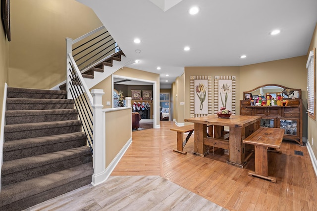 dining space with light wood-type flooring