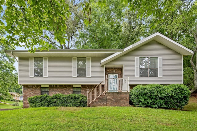 7622 Cove Ridge Dr, Hixson, TN 37343 - split foyer home featuring a front yard and brick siding