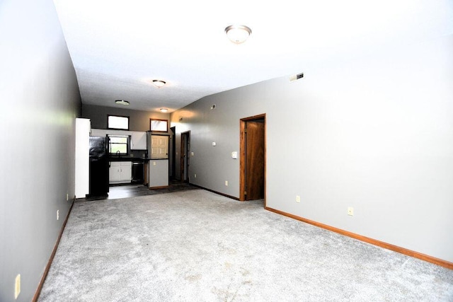 3800 Provence St Unit 10, Chattanooga, TN 37411 - unfurnished living room featuring baseboards and carpet