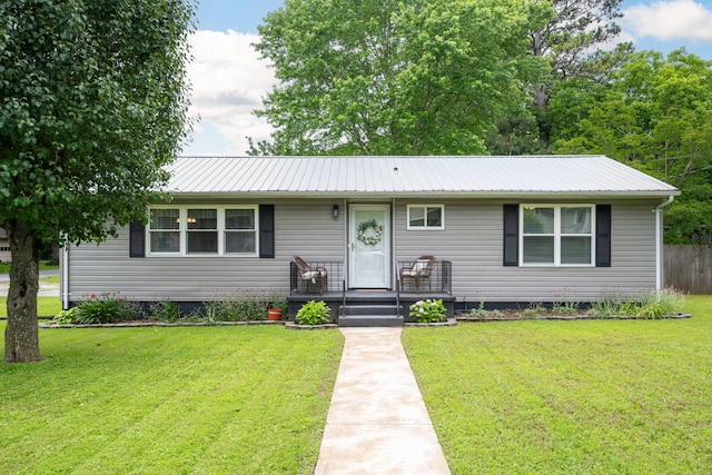 ranch-style house with a front yard