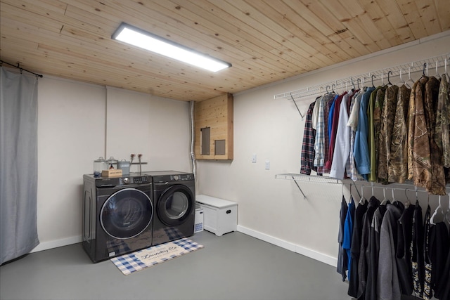 washroom featuring wooden ceiling and separate washer and dryer