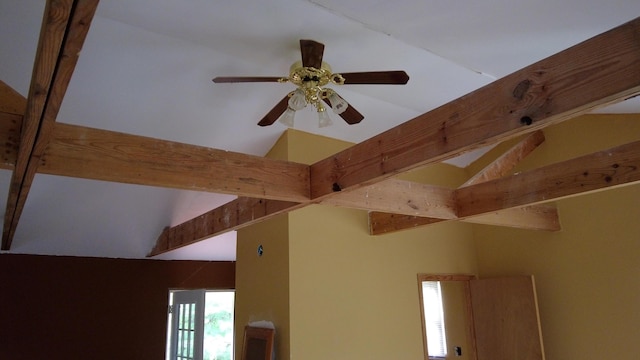 details featuring ceiling fan and beam ceiling