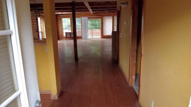 corridor featuring dark hardwood / wood-style flooring