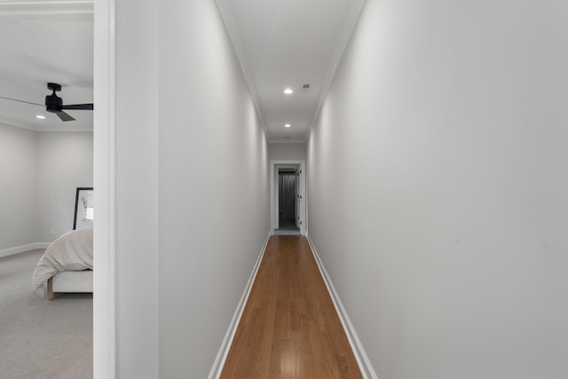 hallway featuring wood-type flooring