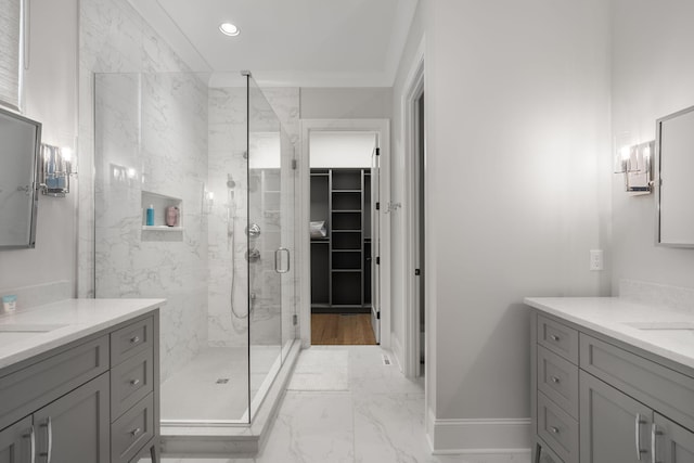 bathroom with vanity and walk in shower