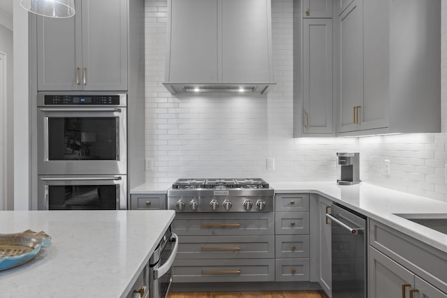 kitchen featuring gray cabinetry and stainless steel appliances