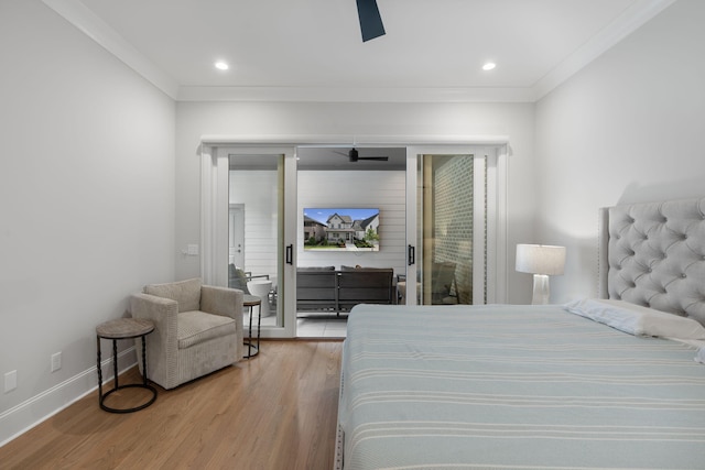 bedroom with ceiling fan, wood-type flooring, and ornamental molding