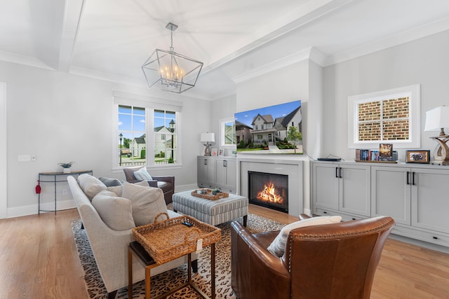 living room with beam ceiling, crown molding, light hardwood / wood-style flooring, and a chandelier