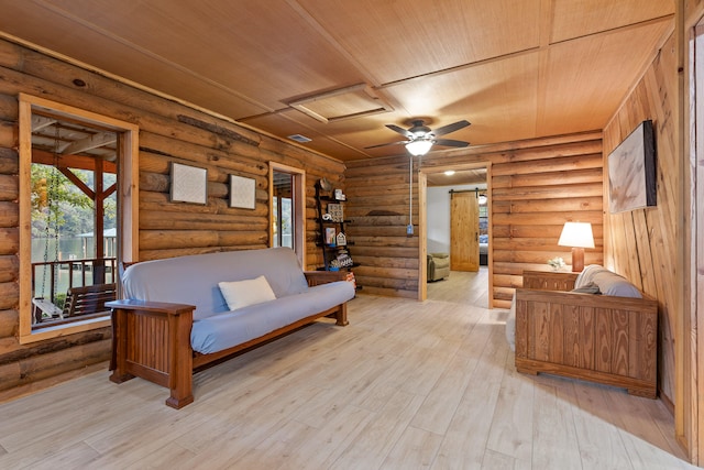 living room with log walls, light hardwood / wood-style floors, ceiling fan, and wooden ceiling