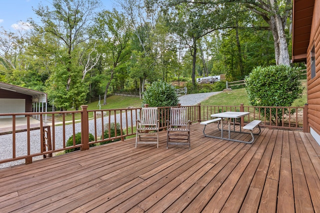 deck featuring a lawn