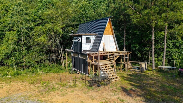 629 Mcdowell Ln, Decatur, TN 37322 - view of outdoor structure featuring stairs and a wooded view