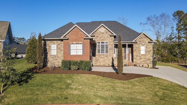 craftsman house with a front lawn