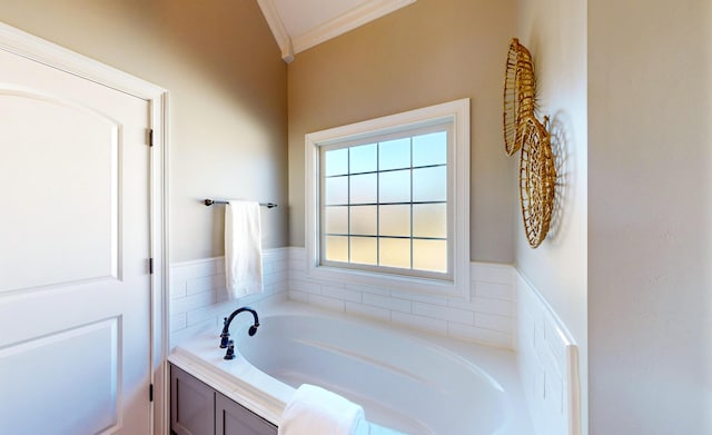 bathroom featuring a bath and crown molding