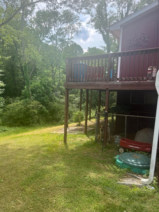 view of yard with a wooden deck