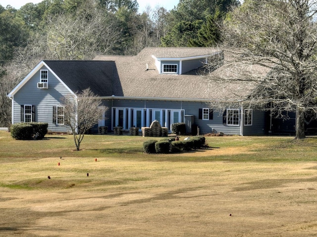 view of front of home with a front yard