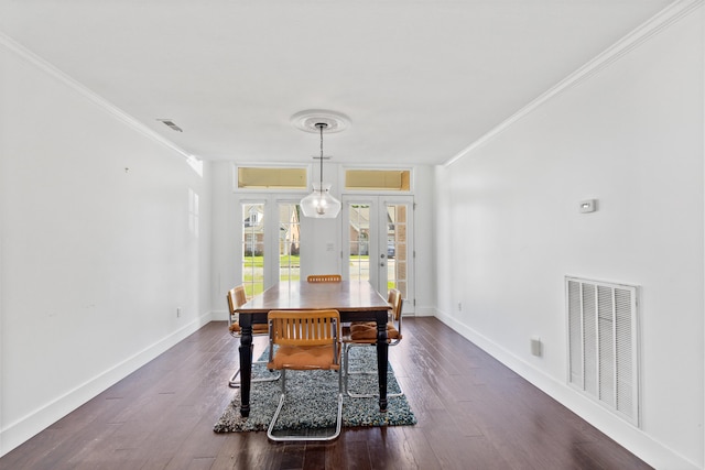 6706 Willow Trace Dr, Chattanooga, TN 37421 - dining space featuring french doors, crown molding, dark wood-style floors, and baseboards
