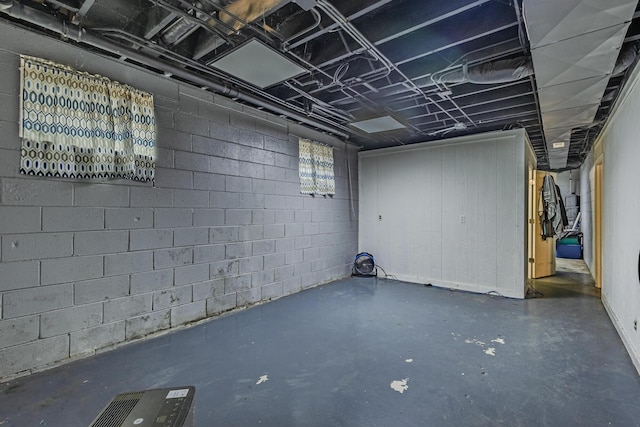 basement with concrete block wall