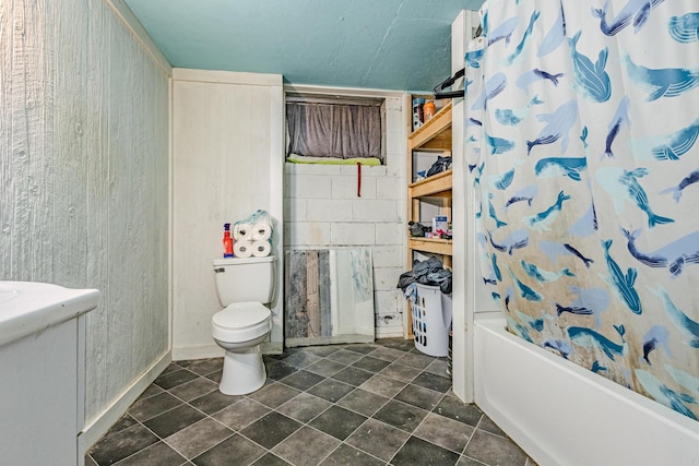 full bathroom with toilet, tile patterned flooring, and shower / bath combination with curtain