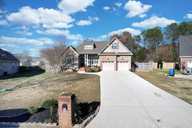 view of front facade featuring a garage and a front yard