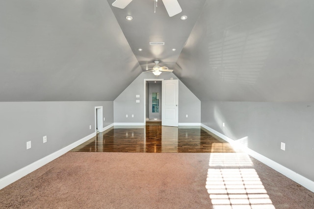 bonus room featuring ceiling fan, dark hardwood / wood-style flooring, and vaulted ceiling