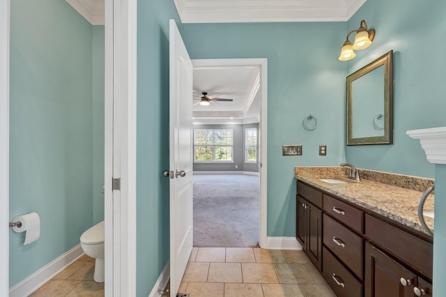 bathroom with ceiling fan and ornamental molding