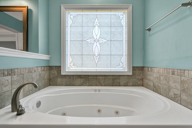 bathroom featuring a washtub