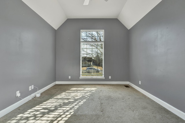 additional living space featuring carpet flooring, ceiling fan, and vaulted ceiling