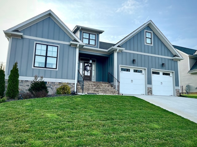 modern farmhouse style home featuring a garage, board and batten siding, driveway, and a front lawn