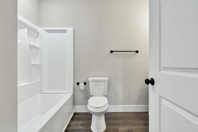 2028 Blythe Ave SE, Cleveland, TN 37311 - bathroom with wood finished floors and washtub / shower combination