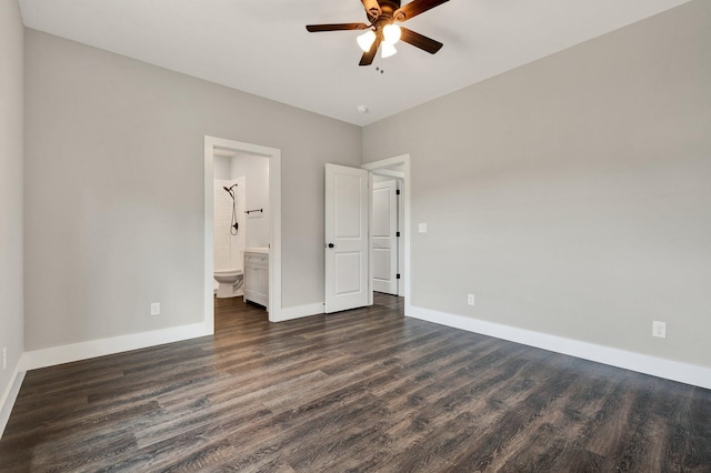2028 Blythe Ave SE, Cleveland, TN 37311 - unfurnished bedroom with dark wood-style floors, ensuite bath, and ceiling fan