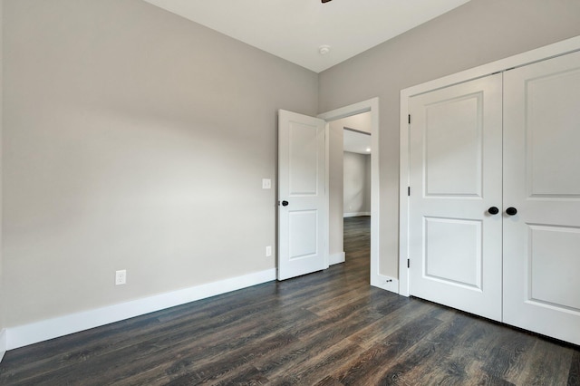 2028 Blythe Ave SE, Cleveland, TN 37311 - unfurnished bedroom featuring dark wood-style floors and a closet