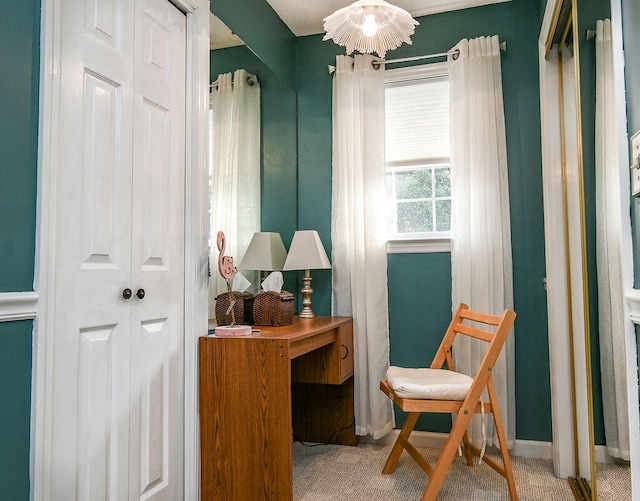 living area featuring light colored carpet