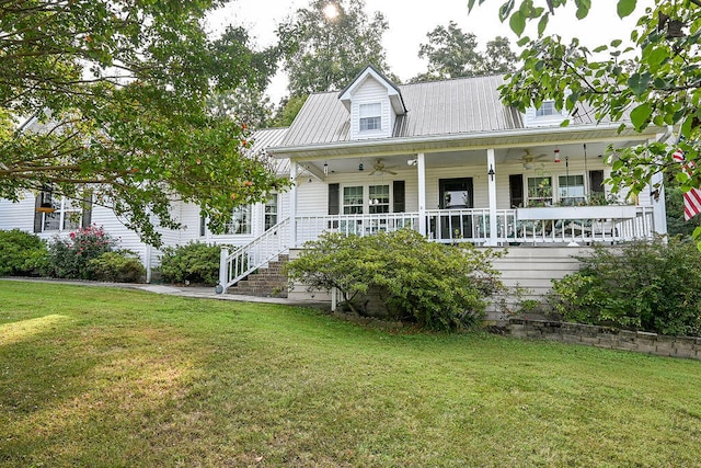 view of front of home featuring covered porch and a front yard