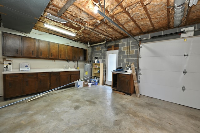 garage with sink and water heater