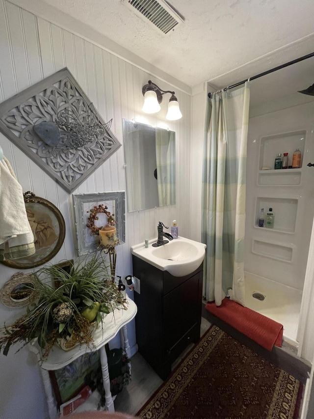 4010 Elm Ln NE, Cleveland, TN 37312 - bathroom with vanity and a shower stall