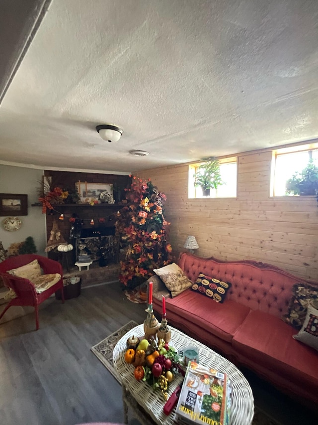 4010 Elm Ln NE, Cleveland, TN 37312 - living area with wood finished floors, wooden walls, and a textured ceiling