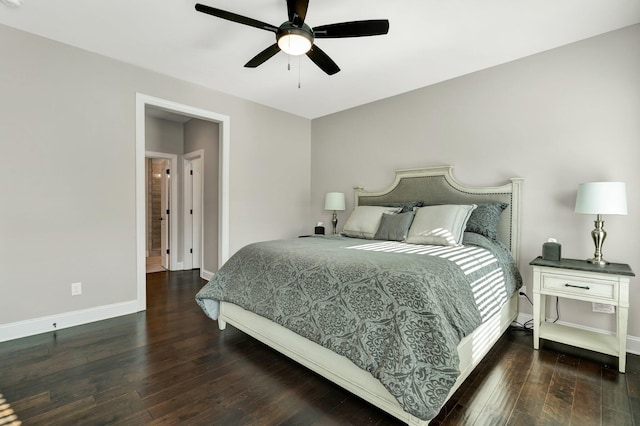 bedroom with ceiling fan and dark hardwood / wood-style floors