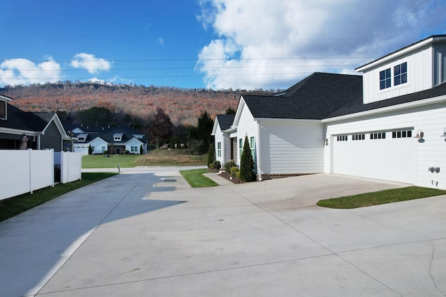 view of home's exterior with a garage